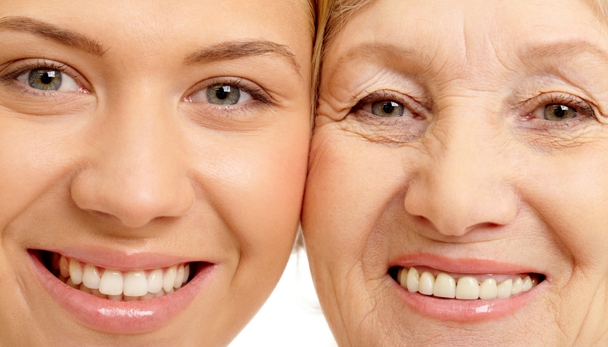 Close-up of two faces of beautiful woman and mother